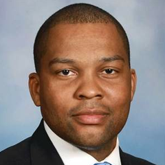 Photo of Rep. John Olumba